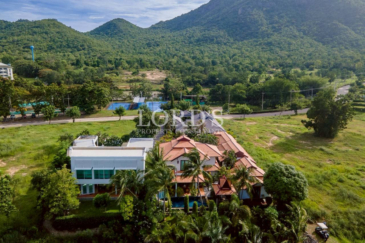 Scenic mountain landscape with tropical residential community