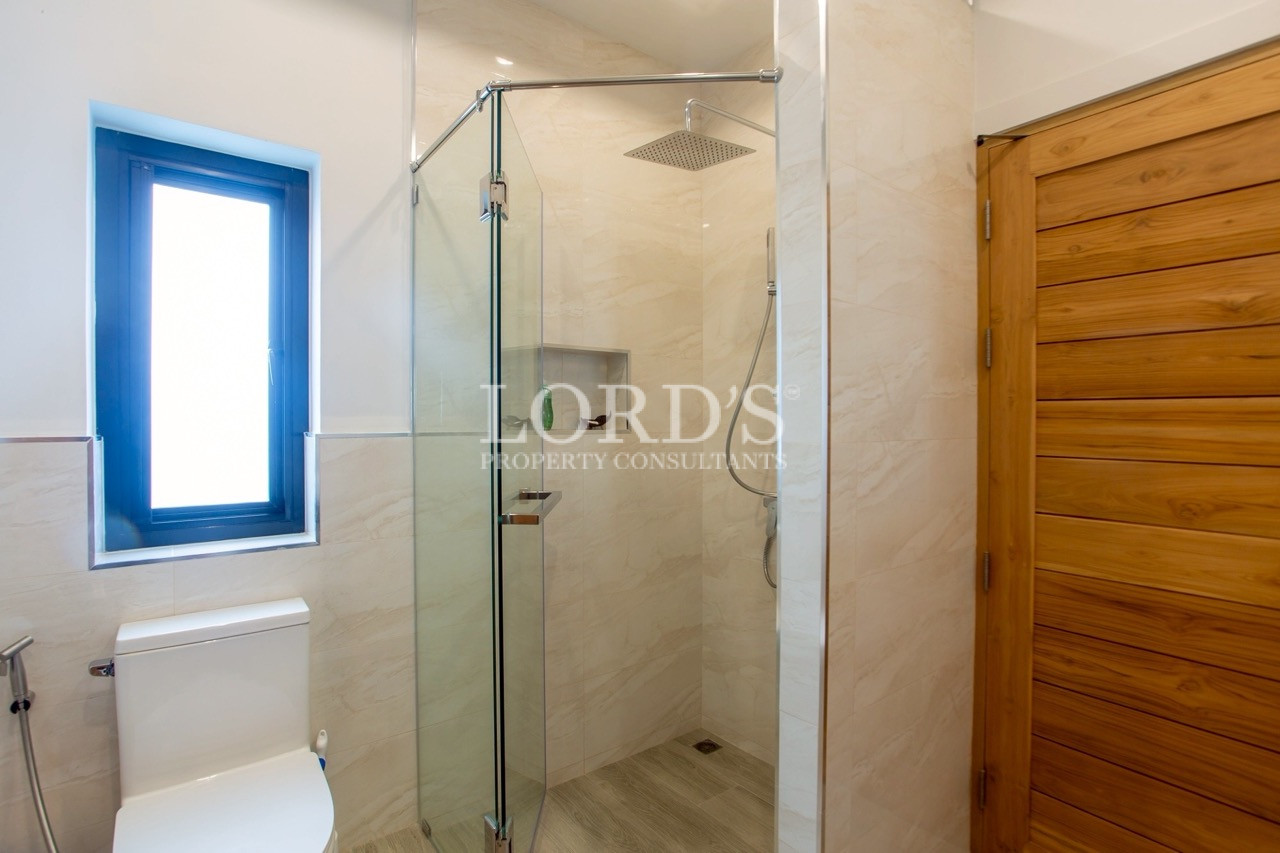 Bathroom with glass shower enclosure