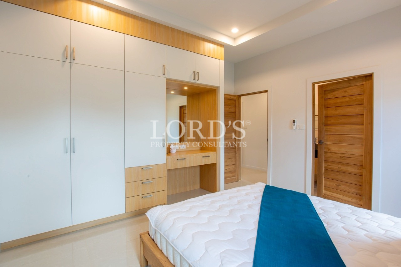 Contemporary bedroom with recessed lighting