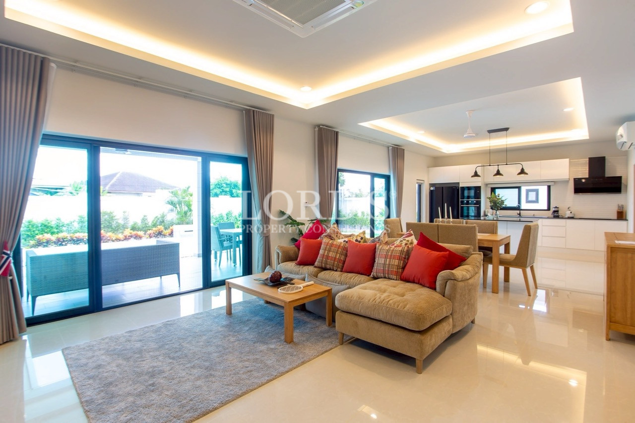 Open-plan living room with recessed lighting