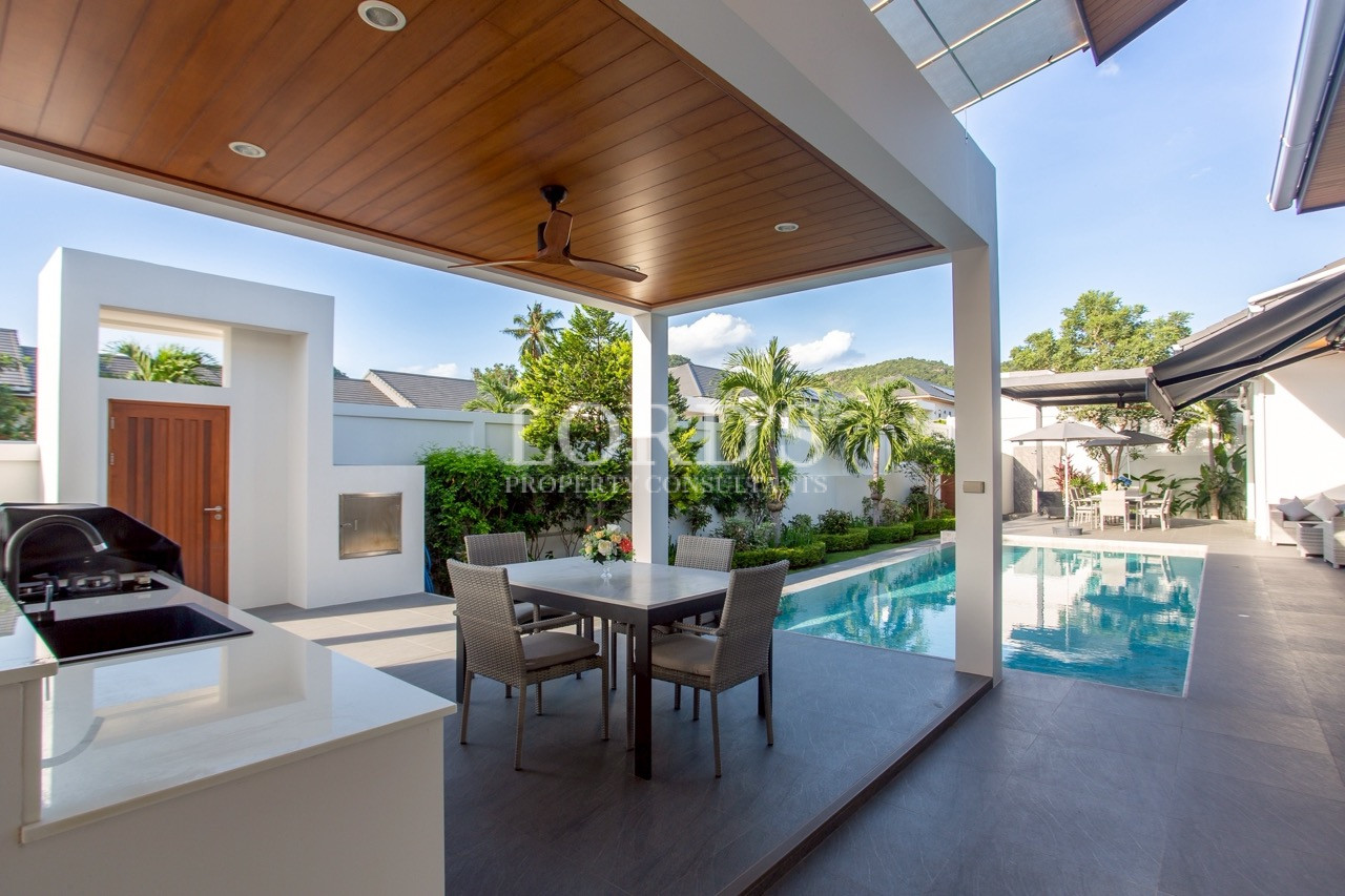 Covered outdoor terrace with timber ceiling