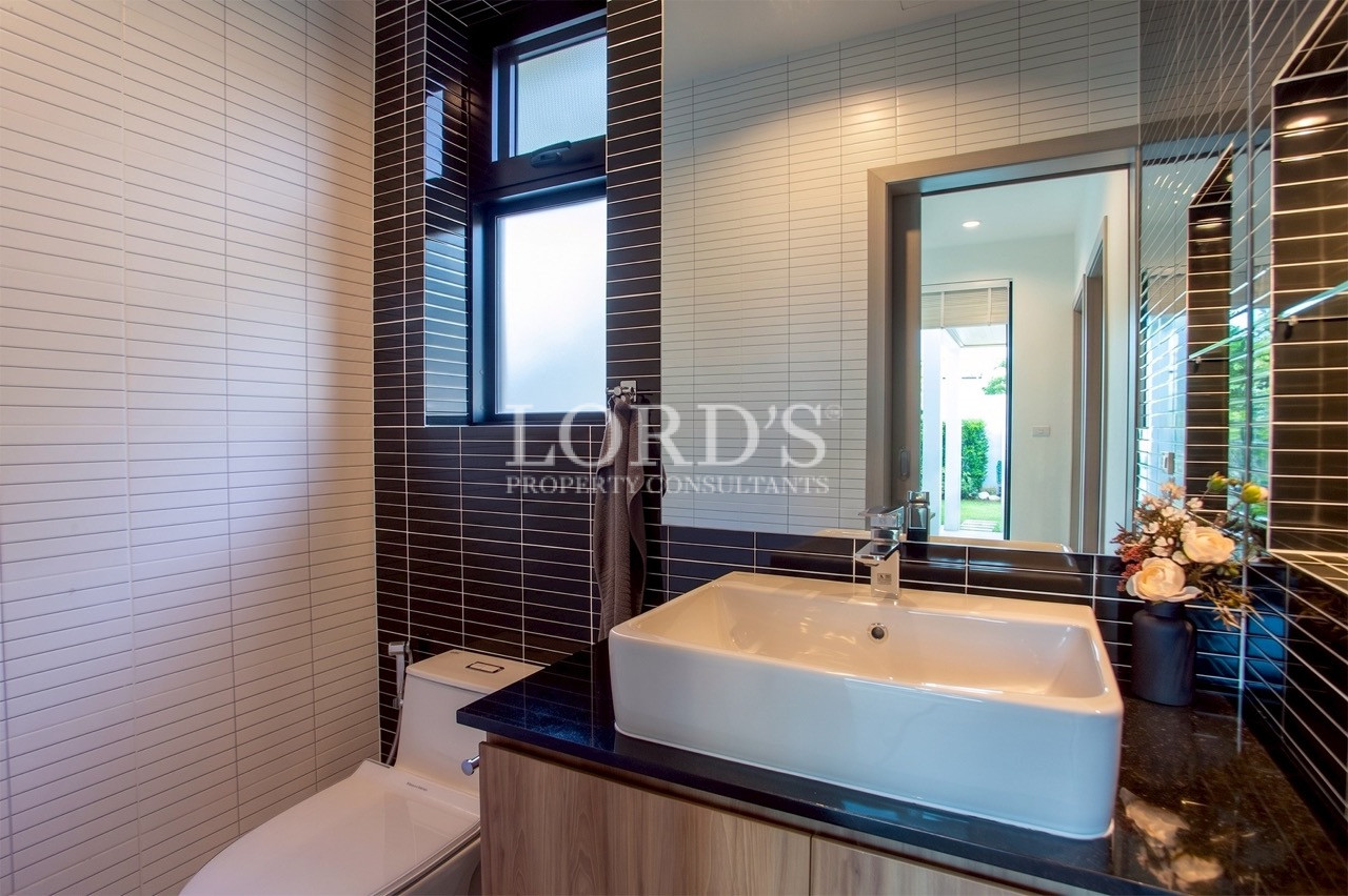 Contemporary bathroom with wood accents