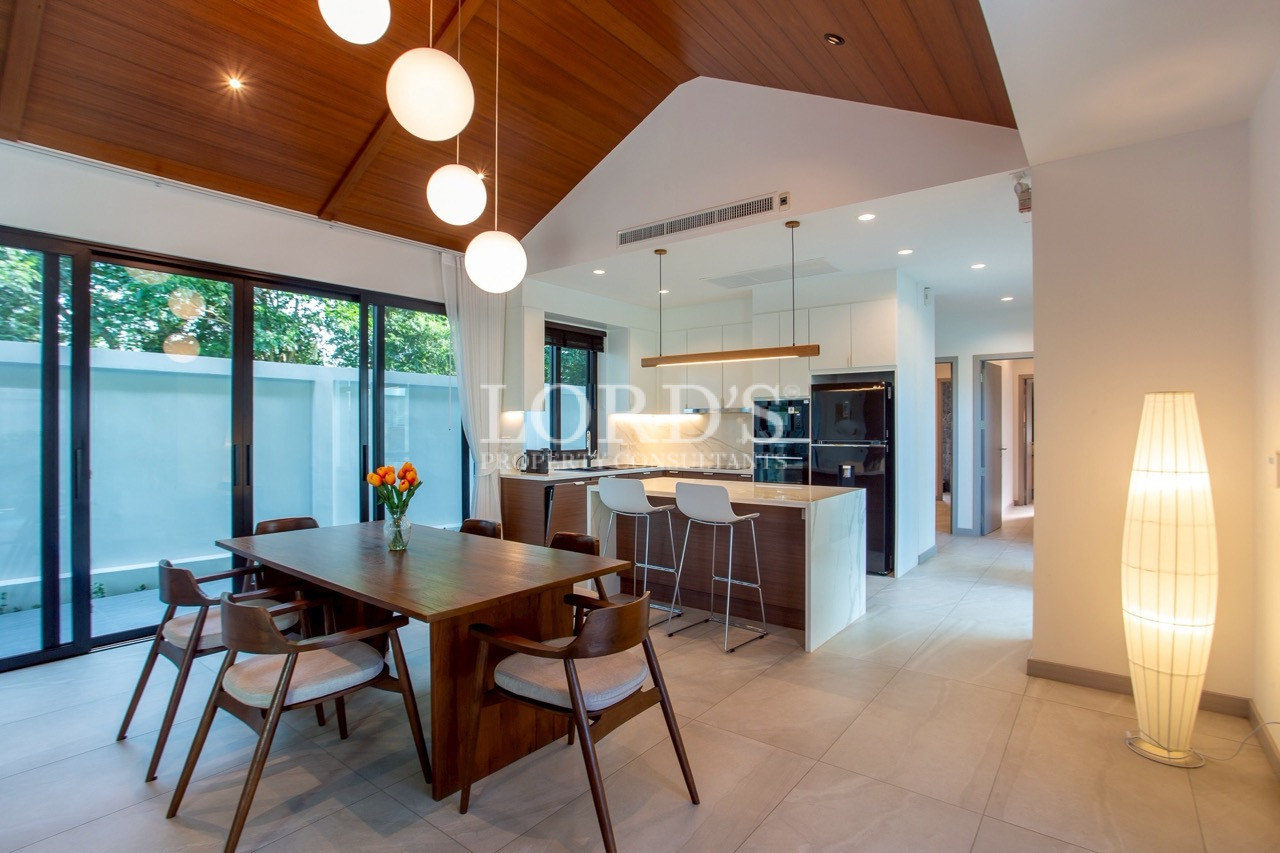 Modern dining area with pendant lights
