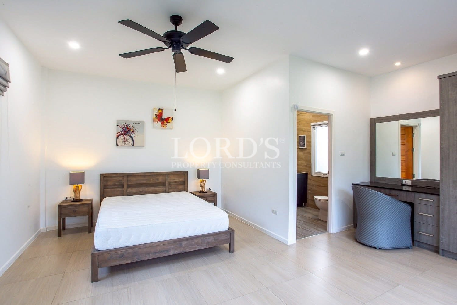Bright guest bedroom with garden views