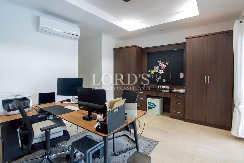 Home office with built-in cabinetry