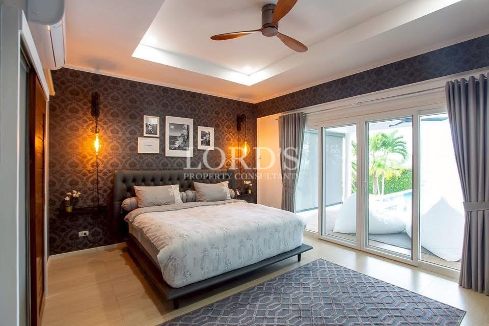 Master bedroom with sliding glass doors