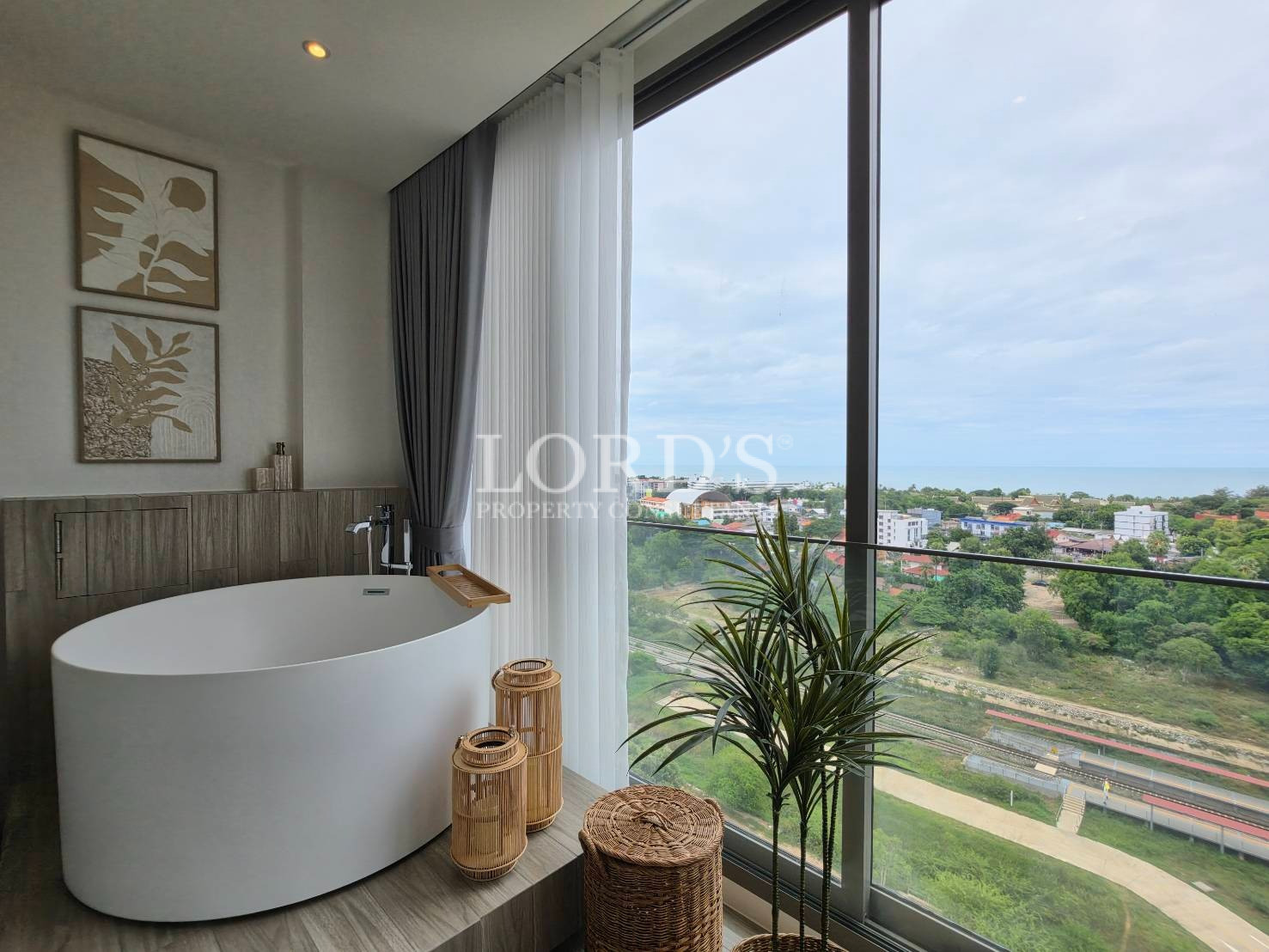 Luxury bedroom with panoramic windows and elegant modern interior
