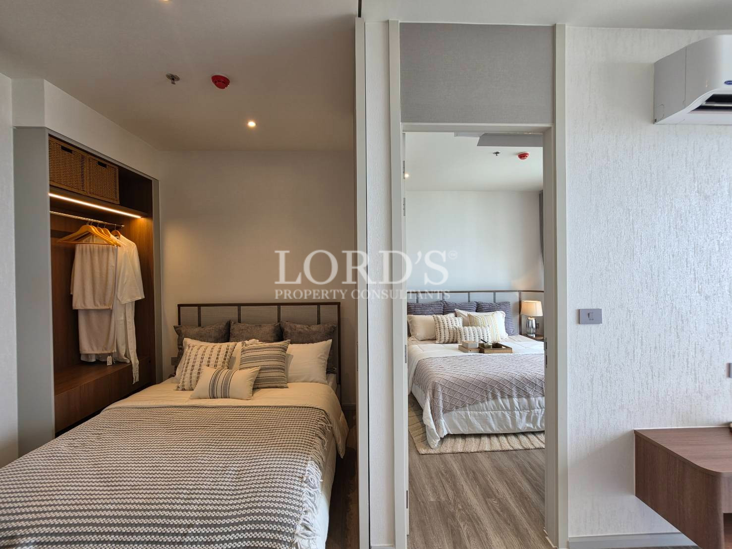Contemporary bedroom with wooden wardrobe and minimalist design