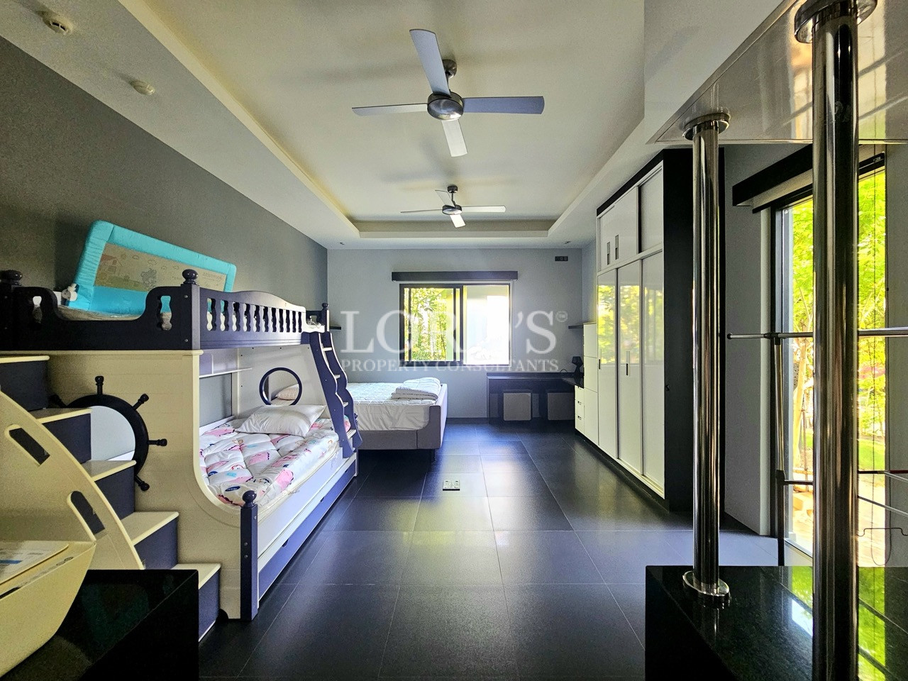 Family bedroom with bunk bed, study area, and built-in wardrobe