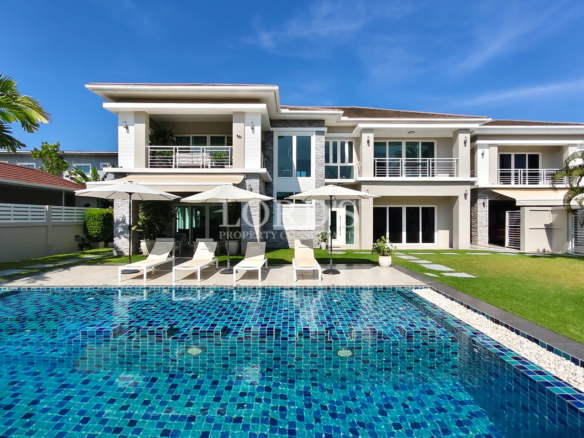 Elegant luxury villa with swimming pool and outdoor patio