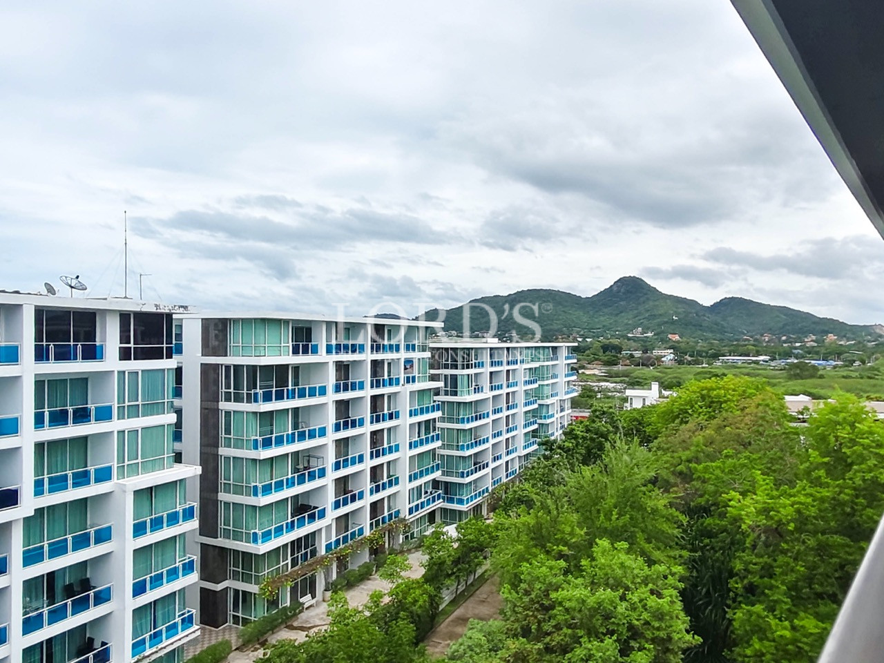 Scenic mountain view from a modern apartment balcony