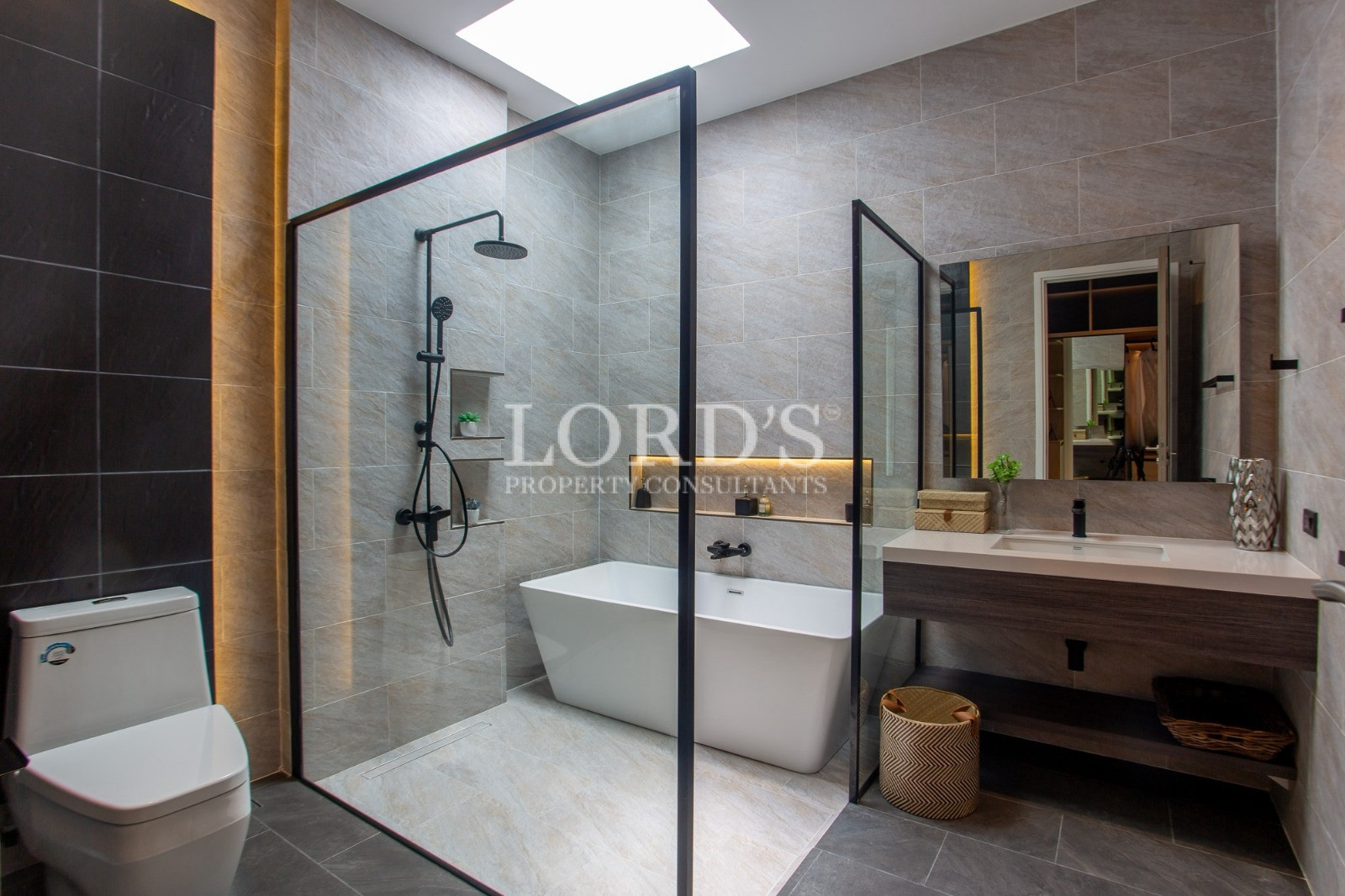 Modern luxury bathroom with freestanding bathtub and glass shower